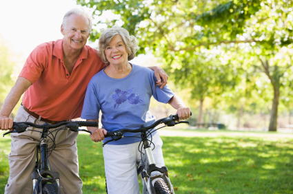 Senior couple on cycle ride in countryside