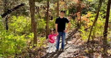 Emily's husband Tyler and their two daughters on a recent family hike