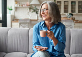 Happy,Beautiful,Relaxed,Mature,Older,Adult,Grey-haired,Woman,Drinking,Coffee